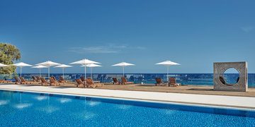 Cavo Orient Beach Hotel &amp; Suites